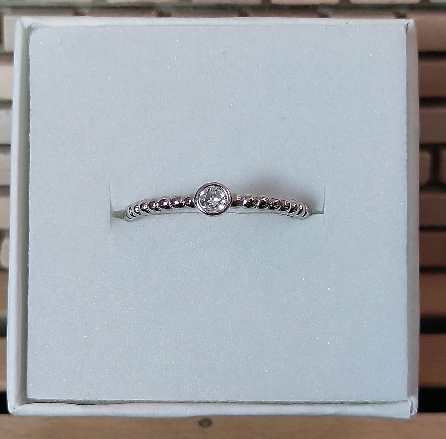 Anillo de Plata rizado con circonita
